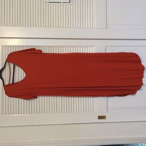 Orange kaftan in size medium with pockets